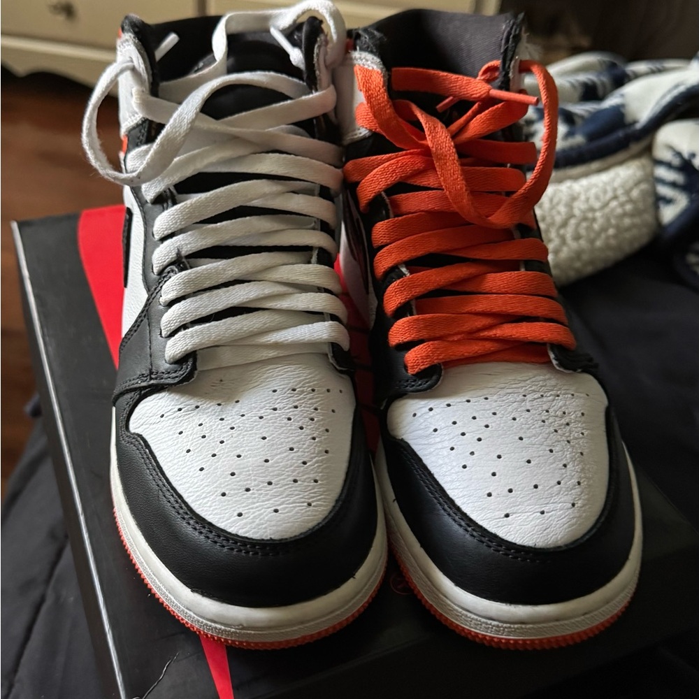 Jordan Black, White, and Orange Sneakers